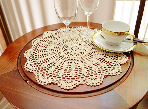 crochet round placemat. 14" round. wheat color. 4 pieces set